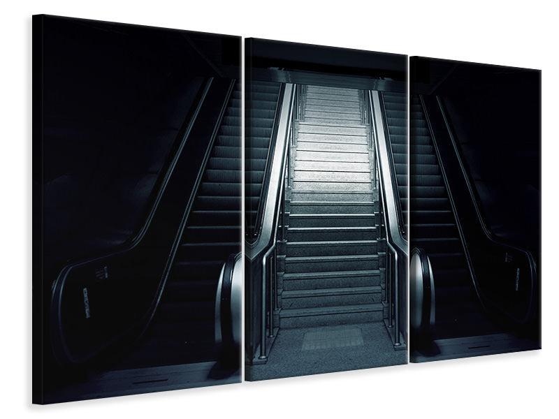 Leinwandbild 3-teilig Rolltreppe in der Dunkelheit
