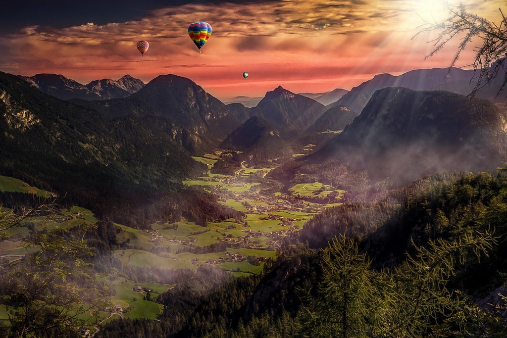Fototapete Heissluft Ballone im Sonnenuntergang