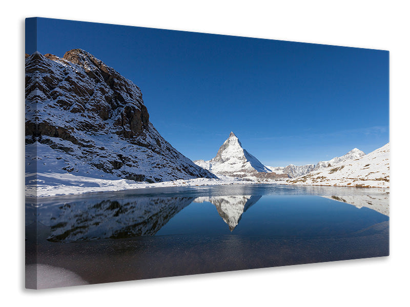 Leinwandbild Der Riffelsee am Matterhorn