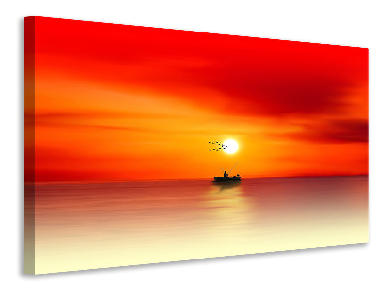 Leinwandbild Ein Fischer im Sonnenuntergang