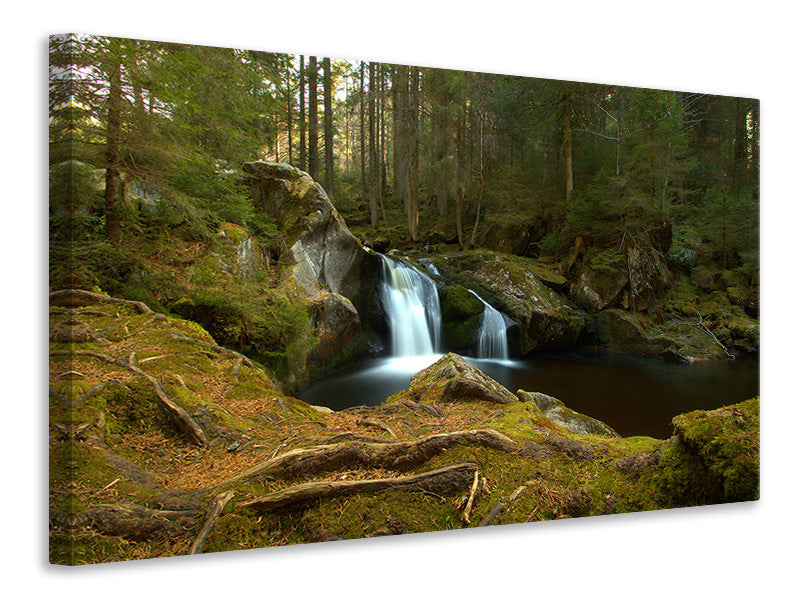 Leinwandbild Kleiner Wasserfall im Wald
