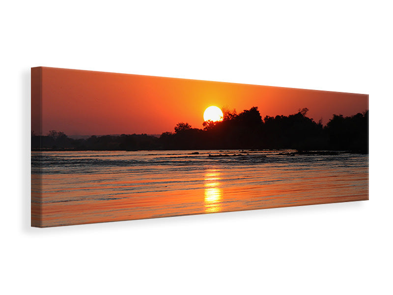 Leinwandbild Panorama Der glühende Sonnenuntergang